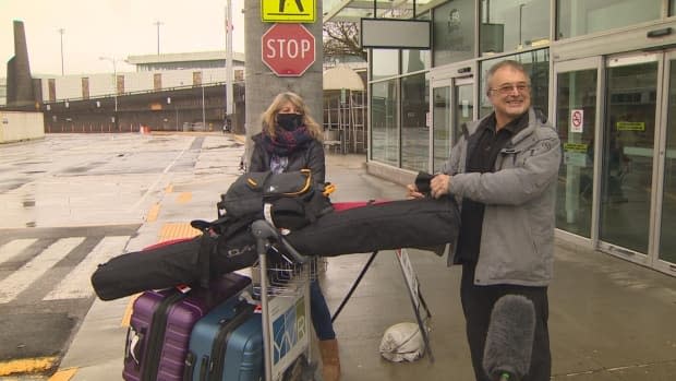 'Its nice to be on the West Coast,' said this man after arriving at YVR from Quebec. 'Wear the masks where necessary, keep your distance and do it safely,' he said.