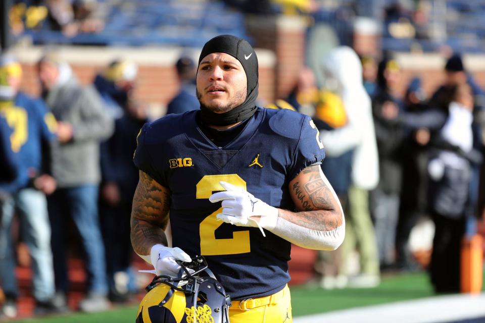 Michigan running back Blake Corum takes the field before action against Illinois.