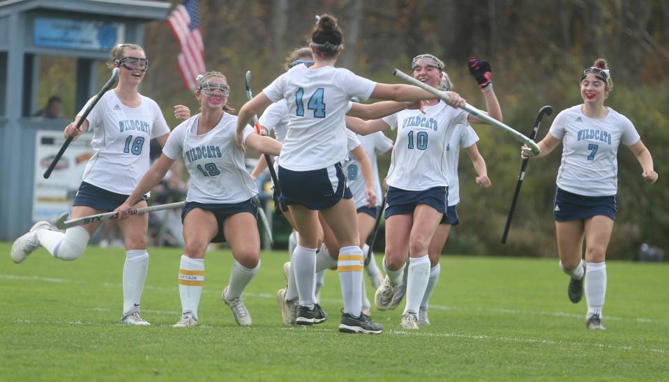 Members of the York High School field hockey team celebrate after Wednesday's 4-1 win over Cape Elizabeth in a Class B South first-round game. York will face top-seed Yarmouth on Saturday in a Class B South semifinal.