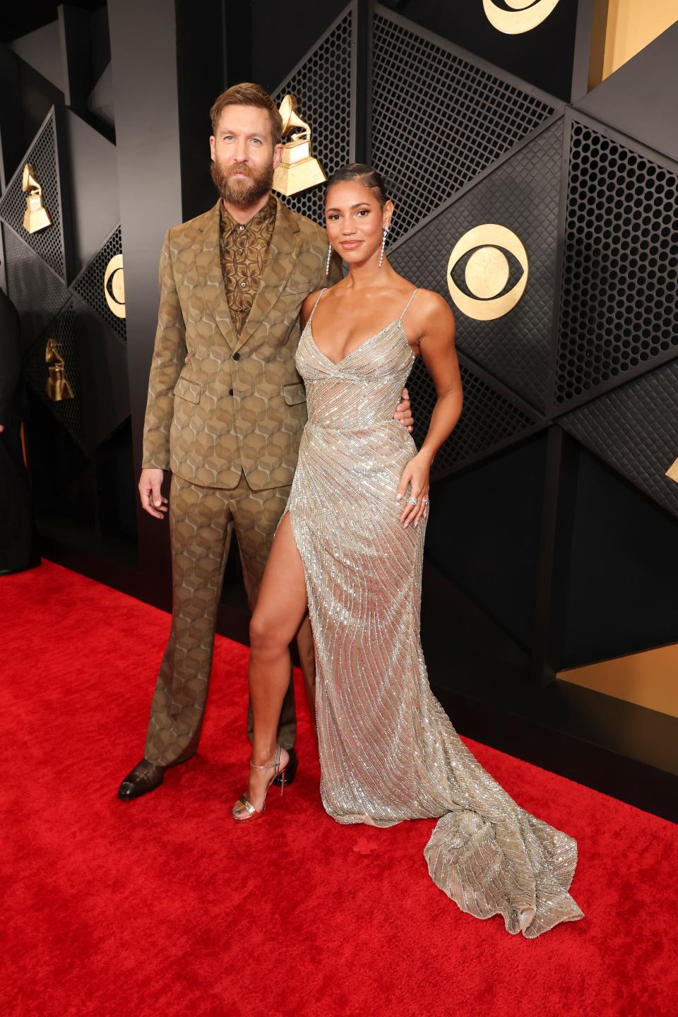 Calvin Harris and Vick Hope attend the 2024 Grammys.