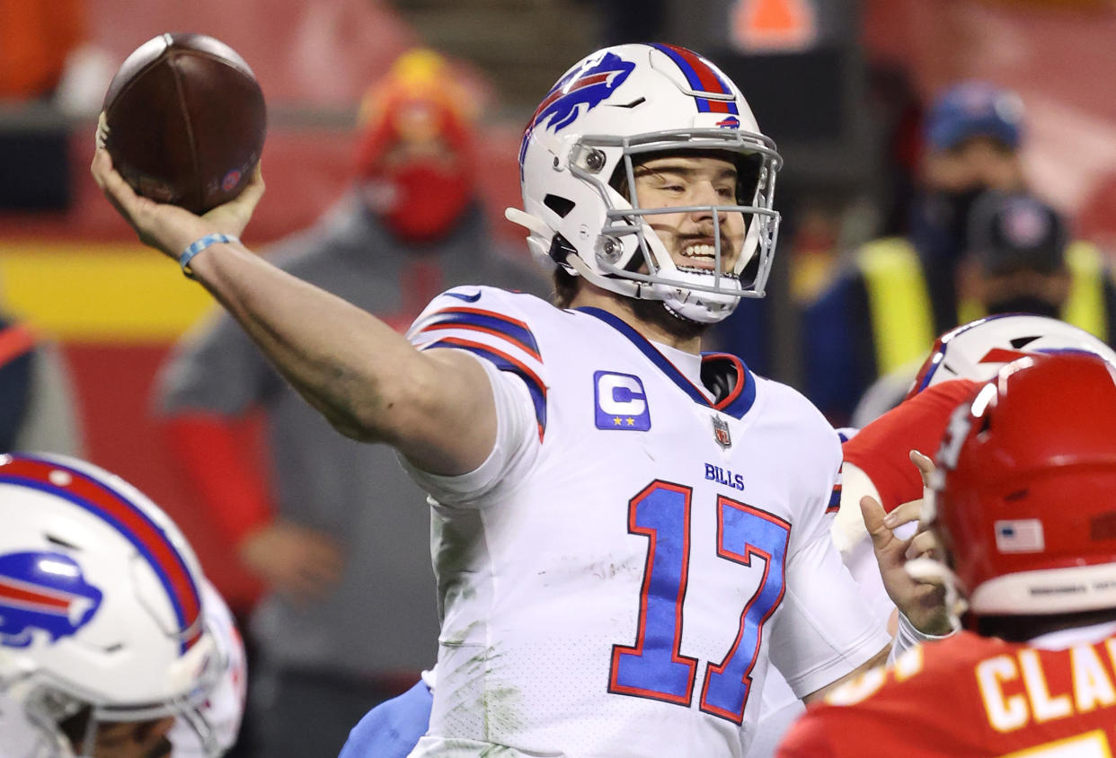 KANSAS CITY, MISSOURI - JANUARY 24: Josh Allen #17 of the Buffalo Bills throws a pass in the first half against the Kansas City Chiefs during the AFC Championship game at Arrowhead Stadium on January 24, 2021 in Kansas City, Missouri. (Photo by Jamie Squire/Getty Images)