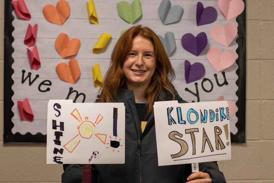 Grace Walsh, a senior on Purdue University's women’s soccer team and the director of outreach of the student-athlete advisory committee, holds the signs she used to welcome students of Klondike Elementary School as part of the school's Great Kindness Challenge Week, on Monday, Jan. 24, 2022, in West Lafayette. Walsh is also the director of outreach of the student-athlete advisory committee.