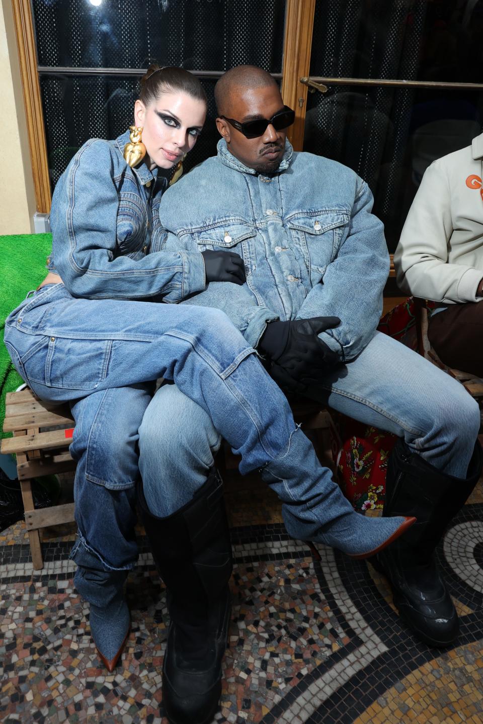 (L to R) Julia Fox and Ye attend the Kenzo Fall/Winter 2022/2023 show as part of Paris Fashion Week on January 23, 2022 in Paris, France.