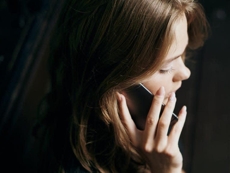 woman talking on phone