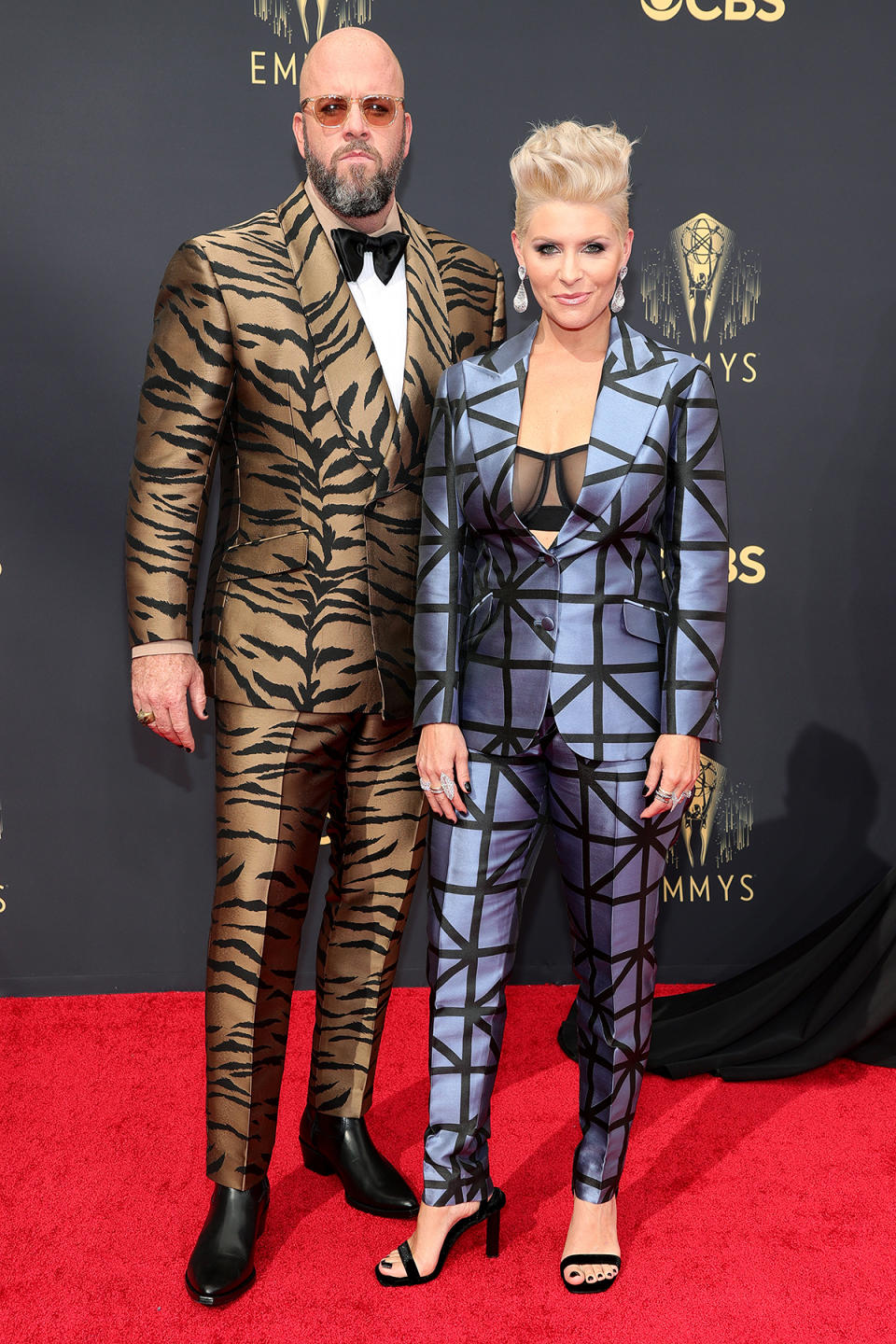 <p>Chris Sullivan and his wife Rachel said <em>This Is Us </em>in some truly eye-catching suits. Rachel opted for a geometric suit, while Chris was on the prowl in a tiger-print suit. </p>