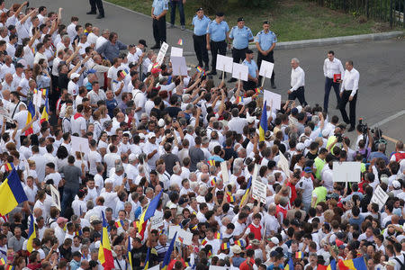 Romania's ruling Social Democratic Party leader Liviu Dragnea (top 3rd R) walks in front of supporters during a demonstration in Bucharest, Romania, June 9, 2018. Inquam Photos/Octav Ganea via REUTERS