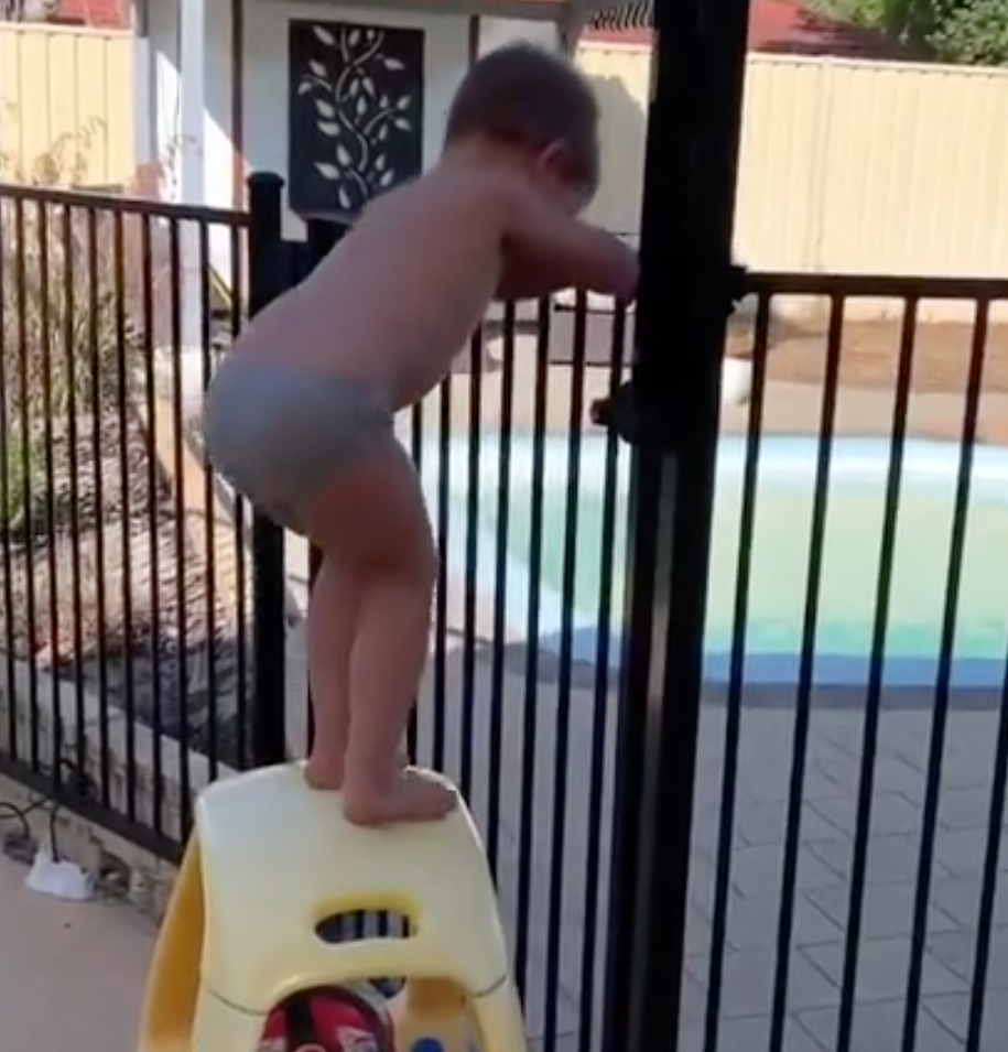 The boy stood on his toy car and opened the magnetic latch. Source: Facebook