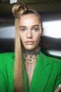 <p>Like The Blonds show but without the crazy purple extensions, the hair look at Area also saw models rocking a super-high bun with the length of their hair falling to one side.</p>
