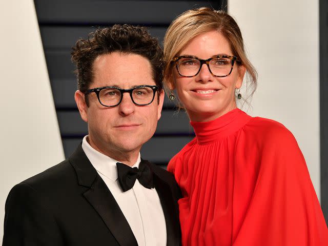 <p>Dia Dipasupil/Getty</p> J.J. Abrams and his wife Katie McGrath at the 2019 Vanity Fair Oscar Party.