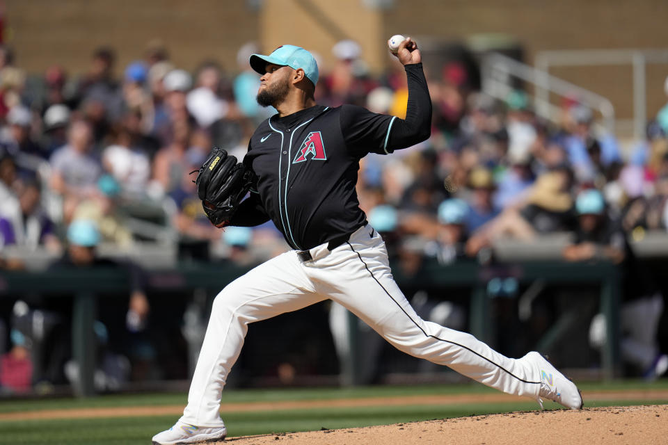 Arizona Diamondbacks starting pitcher Eduardo Rodriguez throws against the Milwaukee Brewers during the second inning of a spring training baseball game Sunday, March 3, 2024, in Scottsdale, Ariz. (AP Photo/Ross D. Franklin)