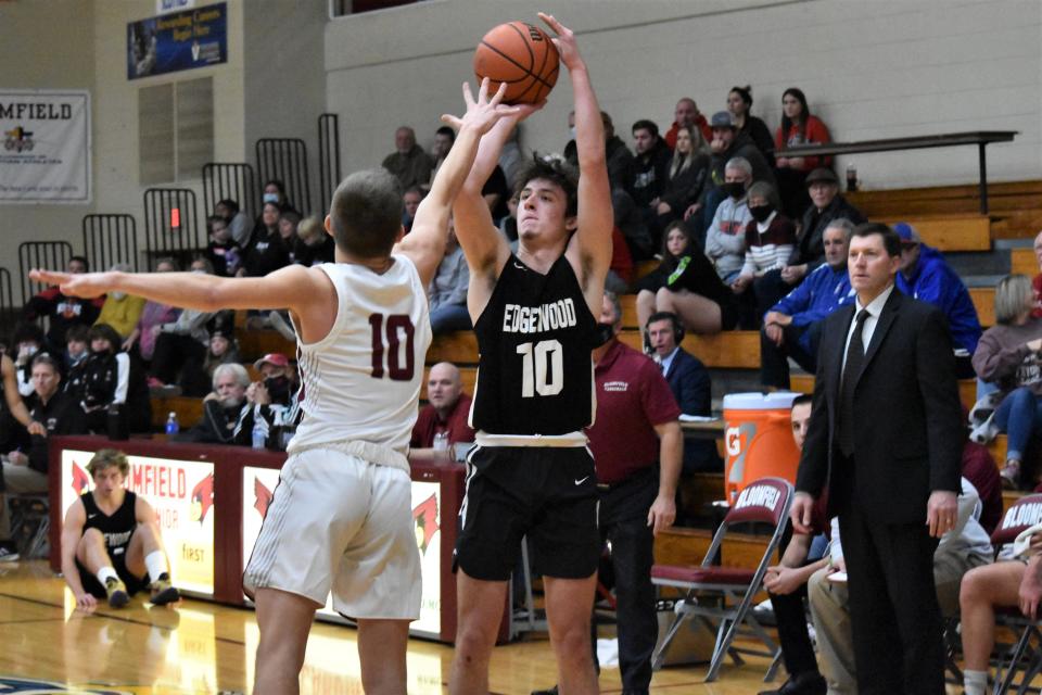 Caden Huttenlocker fires a 3-pointer against Bloomfield.