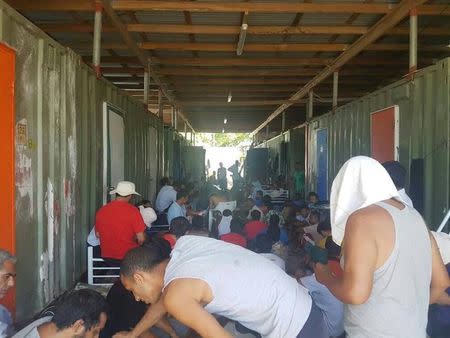 Men occupy the closed Manus Island immigration detention centre in Papua New Guinea, November 23, 2017. Abdul Aziz/Handout via REUTERS