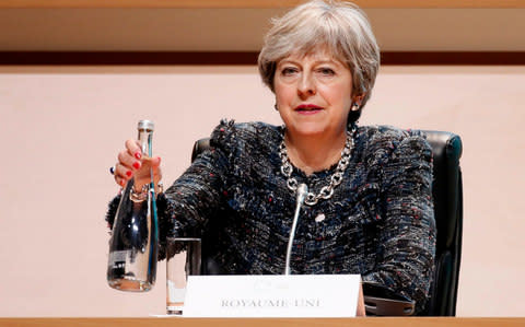 Theresa May attends the plenary session of One Planet Summit, in Boulogne - Credit:  Etienne Laurent/ EPA