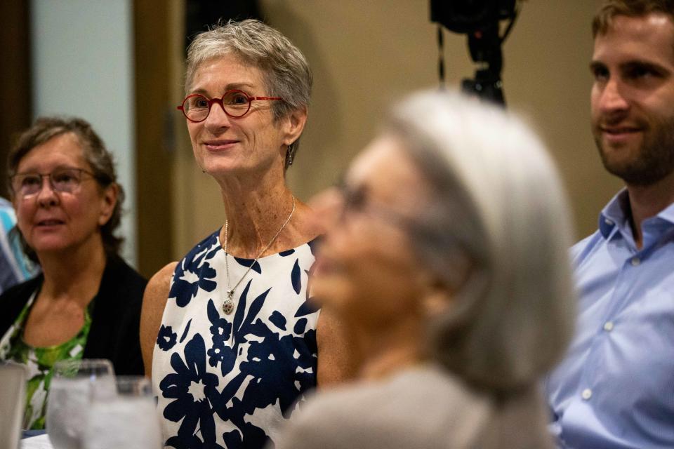 Tamsin Troff smiles as her mother is awarded her grandfather's WWI medals Tuesday, Aug. 16, 2022, at Seventy-Six Restaurant in Holland.