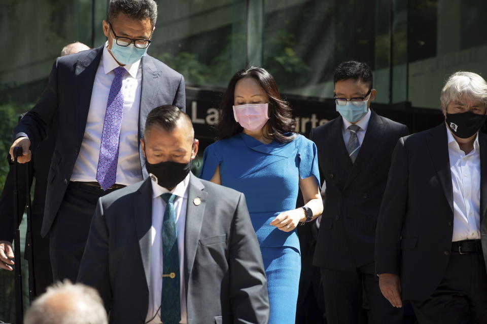 Meng Wanzhou, chief financial officer of Huawei, leaves British Columbia Supreme Court during a break from her extradition hearing, in Vancouver, British Columbia, Wednesday, Aug. 4, 2021. (Darryl Dyck/The Canadian Press via AP)