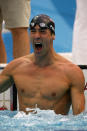 BEIJING - AUGUST 16: Michael Phelps of the United States celebrates victory in the Men's 100m Butterfly Final held at the National Aquatics Centre during Day 8 of the Beijing 2008 Olympic Games on August 16, 2008 in Beijing, China. By winning gold in the Men's 100m Butterfly Phelps tied Mark Spitz's record of winning seven gold medals in a single Olympic Games. (Photo by Shaun Botterill/Getty Images)