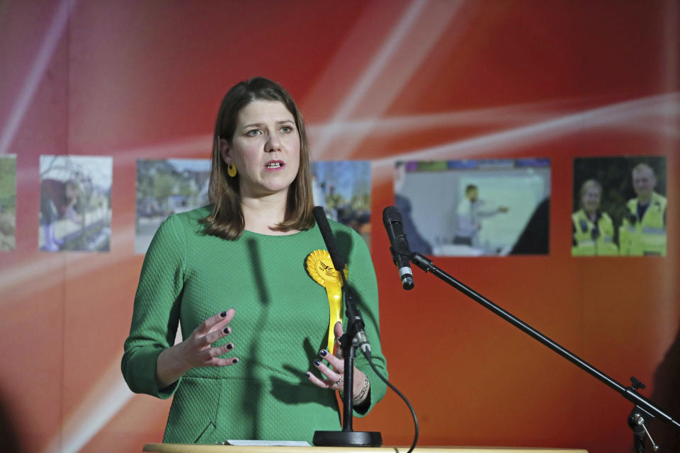 Lib Dem leader Jo Swinson, second right, reacts as she loses her East Dumbartonshire constituency, during the count at the Leisuredome, Bishopbriggs, Scotland, Friday Dec. 13, 2019. (Jane Barlow/PA via AP)