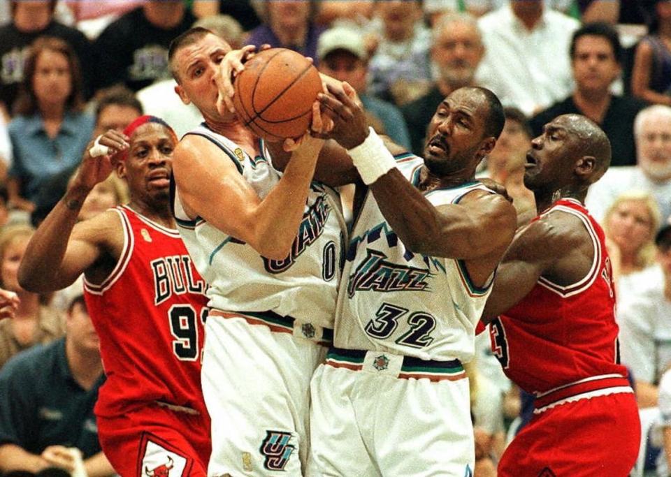<div class="inline-image__caption"><p>Greg Ostertag and Karl Malone of the Utah Jazz fight for a loose ball with <span class="caas-xray-inline-tooltip"><span class="caas-xray-inline caas-xray-entity caas-xray-pill rapid-nonanchor-lt" data-entity-id="Dennis_Rodman" data-ylk="cid:Dennis_Rodman;pos:3;elmt:wiki;sec:pill-inline-entity;elm:pill-inline-text;itc:1;cat:Athlete;" tabindex="0" aria-haspopup="dialog"><a href="https://search.yahoo.com/search?p=Dennis%20Rodman" data-i13n="cid:Dennis_Rodman;pos:3;elmt:wiki;sec:pill-inline-entity;elm:pill-inline-text;itc:1;cat:Athlete;" tabindex="-1" data-ylk="slk:Dennis Rodman;cid:Dennis_Rodman;pos:3;elmt:wiki;sec:pill-inline-entity;elm:pill-inline-text;itc:1;cat:Athlete;" class="link ">Dennis Rodman</a></span></span> and <span class="caas-xray-inline-tooltip"><span class="caas-xray-inline caas-xray-entity caas-xray-pill rapid-nonanchor-lt" data-entity-id="Michael_Jordan" data-ylk="cid:Michael_Jordan;pos:4;elmt:wiki;sec:pill-inline-entity;elm:pill-inline-text;itc:1;cat:Athlete;" tabindex="0" aria-haspopup="dialog"><a href="https://search.yahoo.com/search?p=Michael%20Jordan" data-i13n="cid:Michael_Jordan;pos:4;elmt:wiki;sec:pill-inline-entity;elm:pill-inline-text;itc:1;cat:Athlete;" tabindex="-1" data-ylk="slk:Michael Jordan;cid:Michael_Jordan;pos:4;elmt:wiki;sec:pill-inline-entity;elm:pill-inline-text;itc:1;cat:Athlete;" class="link ">Michael Jordan</a></span></span> of the Chicago Bulls during Game 4 of the 1997 NBA Finals at the Delta Center in Salt Lake City, Utah, on June 8, 1997. </p></div> <div class="inline-image__credit">Jeff Haynes/AFP/Getty</div>