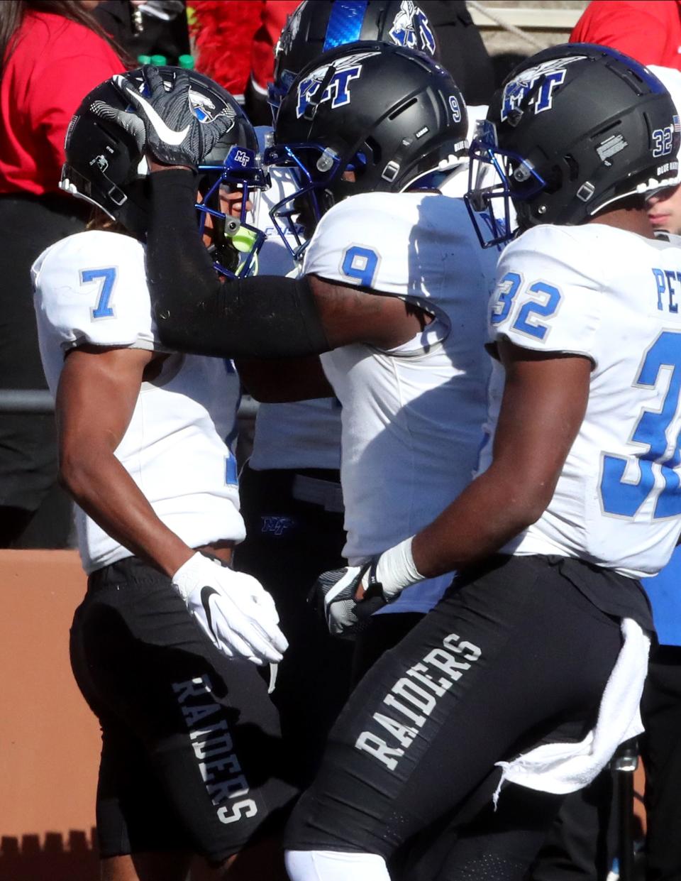 MTSU wide receiver Jarrin Pierce (9) congratulates MTSU wide receiver DJ England-Chisolm (7) for scoring a touchdown against Western on Saturday, Nov. 6, 2021, at Houchens-Smith Stadium, in Bowling Green, Ky. 