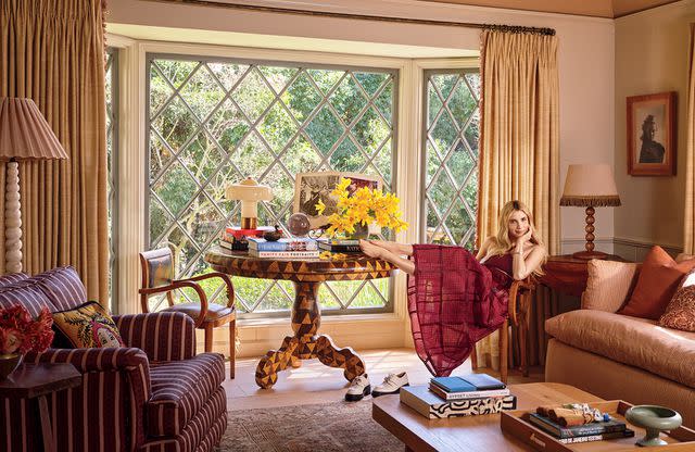 <p>Michael P. H. Clifford/Architectural Digest</p> Emma Roberts in her living room