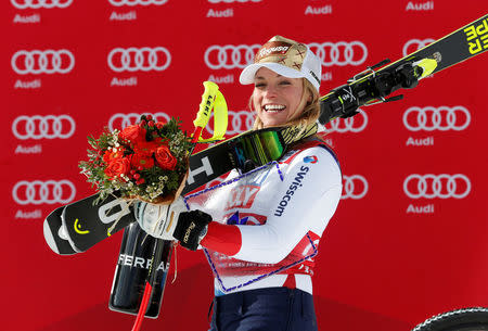 Skiing - Alpine Skiing World Cup - Women's Alpine Super G - Cortina d'Ampezzo, Italy - January 21, 2018. Lara Gut of Switzerland celebrates on the podium. REUTERS/Stefano Rellandini