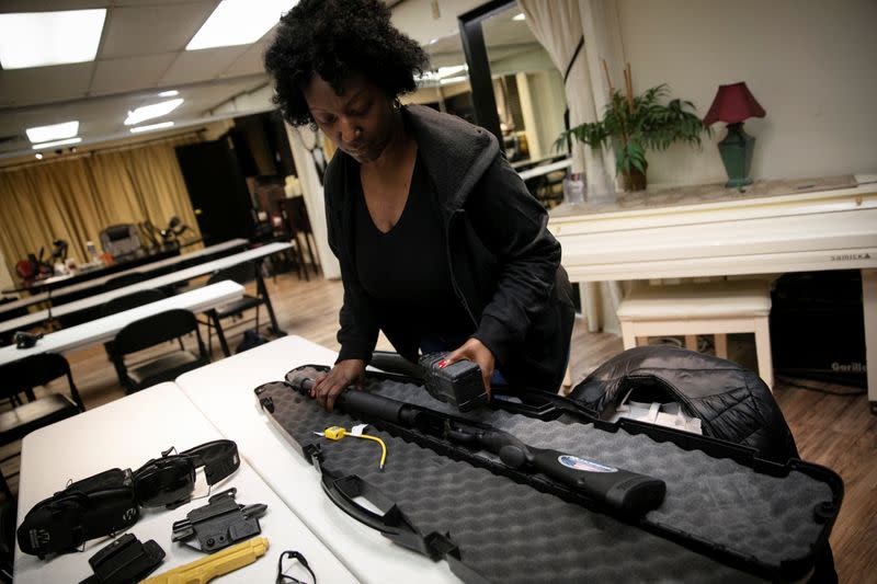 Andreyah Garland, a 44-year-old single mother of three daughters during a gun training session in Newburgh