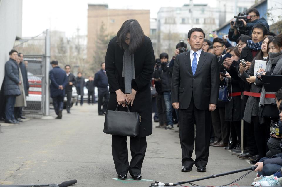 Cho Hyun-ah, also known as Heather Cho, daughter of chairman of Korean Air Lines, Cho Yang-ho, bows in front of the media outside the offices of the Aviation and Railway Accident Investigation Board of the Ministry of Land, Infrastructure, Transport, in Seoul December 12, 2014. Cho, 40, who was an executive at South Korea's flag carrier in charge of in-flight service until she quit this week, was being removed from all posts at affiliate companies. On December 19, while at New York's John F. Kennedy airport, seated in first class on a South Korea-bound flight, she was displeased with being served macadamia nuts in a bag and not a dish. The pilot brought the plane back to its gate for the cabin crew chief to be expelled. REUTERS/Song Eun-seok/News1 (SOUTH KOREA - Tags: TRANSPORT CRIME LAW) ATTENTION EDITORS - NO SALES. NO ARCHIVES. FOR EDITORIAL USE ONLY. NOT FOR SALE FOR MARKETING OR ADVERTISING CAMPAIGNS. THIS IMAGE HAS BEEN SUPPLIED BY A THIRD PARTY. IT IS DISTRIBUTED, EXACTLY AS RECEIVED BY REUTERS, AS A SERVICE TO CLIENTS. SOUTH KOREA OUT. NO COMMERCIAL OR EDITORIAL SALES IN SOUTH KOREA