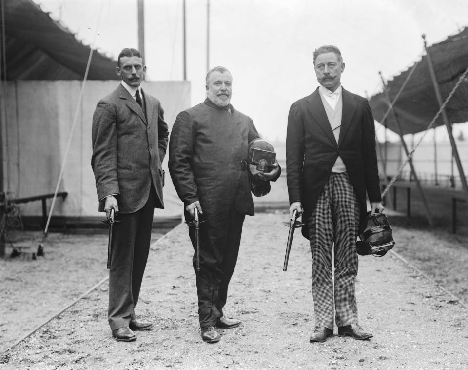 <p>Appearing as a demonstration sport at the 1908 Games, dueling poised two pistol wielding competitors against each other. They fired wax bullets and wore protective gear on the head, hands and torso. </p>