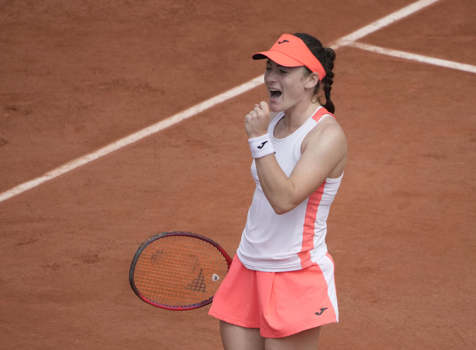 Slovenia's Tamara Zidansek celebrates after winning a point against Romania's Sorana Cirstea during their fourth round match on day 8, of the French Open tennis tournament at Roland Garros in Paris, France, Sunday, June 6, 2021. (AP Photo/Christophe Ena)