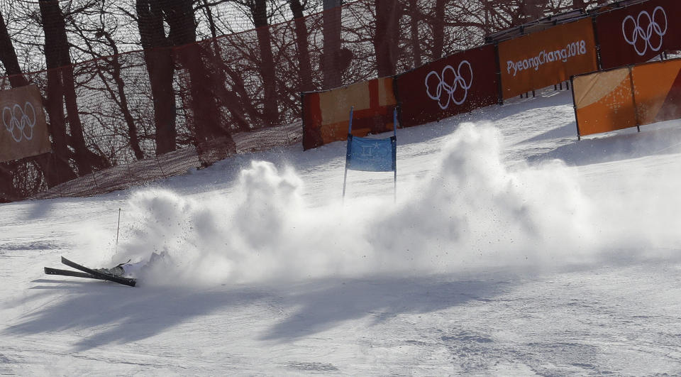 <p>Germany’s Alexander Schmid crashes during the first run of the men’s giant slalom at the 2018 Winter Olympics in Pyeongchang, South Korea, Sunday, Feb. 18, 2018. (AP Photo/Michael Probst) </p>