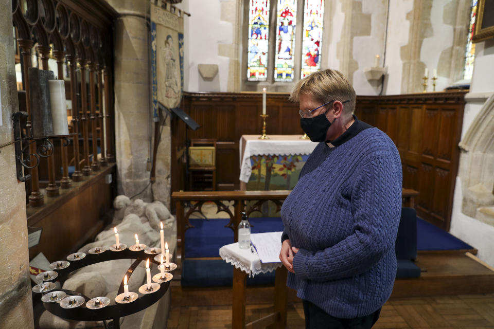 Reverend Jacky Barr at St Andrew's Church, Chinnor, Oxfordshire, following the deaths of Zoe Powell, 29, and her three children - Phoebe, eight, Simeon, six, and Amelia, four - who were killed in a car accident on the A40 near Oxford on Monday night.