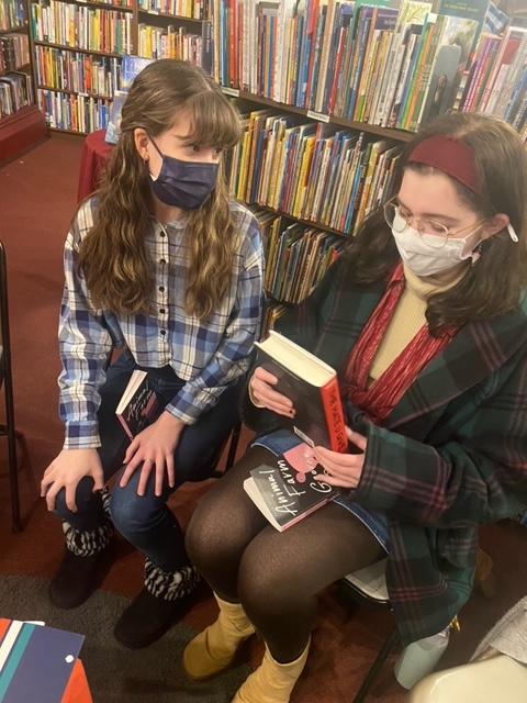 Two members of the Kutztown Banned Book Club discuss the commonly banned book 