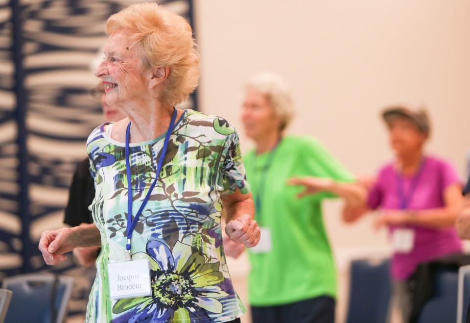 Jacquie Brodeur takes part in a fitness class at Baker Senior Center Naples in North Naples on Monday, Jan. 23, 2023.