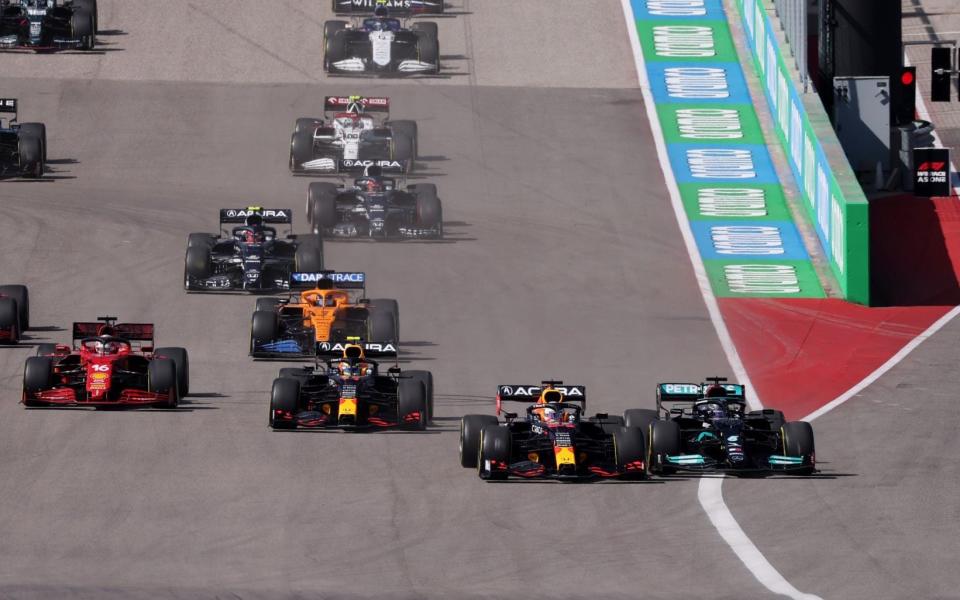 Formula One F1 - United States Grand Prix - Circuit of the Americas, Austin, Texas, U.S. - October 24, 2021 Mercedes' Lewis Hamilton and Red Bull's Max Verstappen in action at the start of the race - REUTERS/Mike Blake