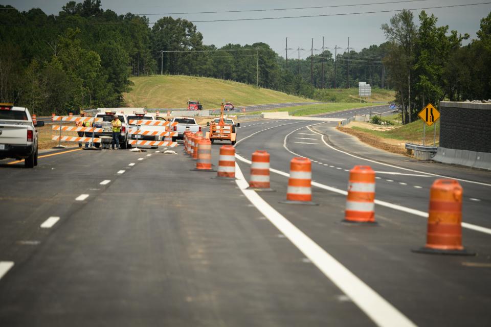 Crews prepare to open up a 2.7-mile segment of the I-295 Fayetteville Outer Loop on Wednesday, Aug. 19, 2020. The section runs from Cliffdale Road to Raeford Road.