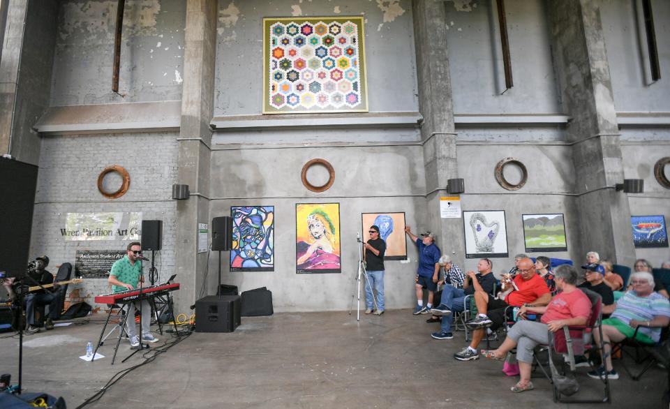 Nathan Angelo plays inside the Wren Pavilion during the fourth week of the Main Street Program's Piedmont Natural Gas Block Party at the Wren Pavilion in downtown Anderson, S.C. May 23. The 16 date season has bands each Thursday 6 p.m., except July 4, through August 25. A forecast of 50 percent possible rain helped organizers decide to move in the sheltered area instead of in the open of Carolina Wren Park, an option which allows the band to play their full set regardless of weather.