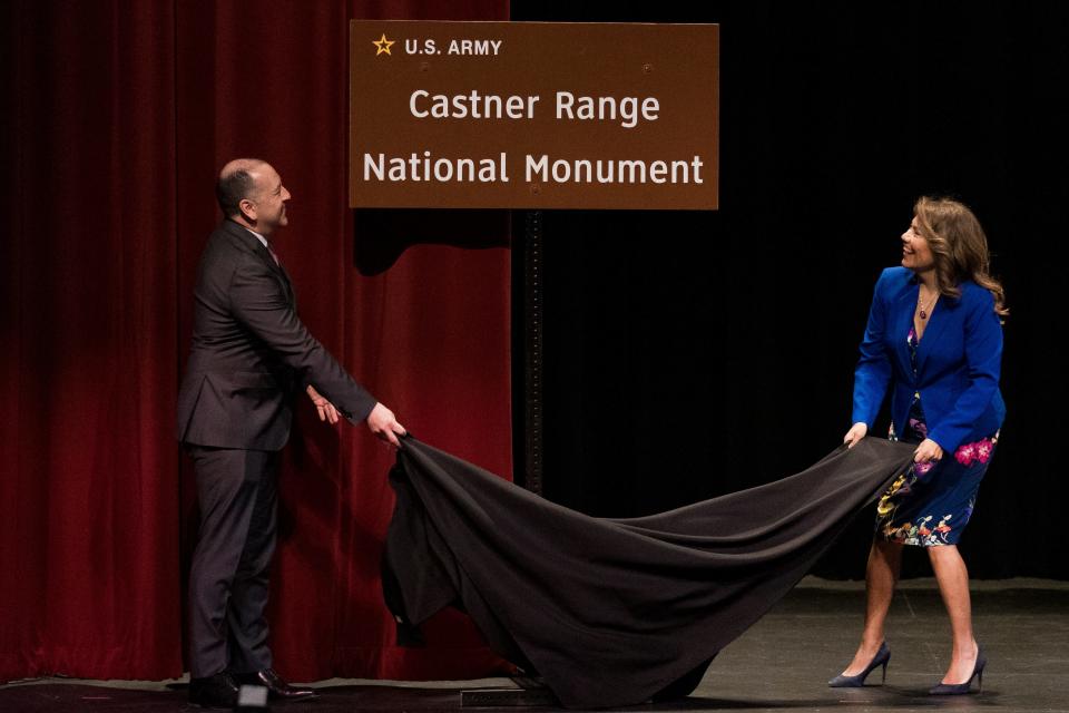 Under Secretary of the Army Gabe Camarillo and U.S. Rep. Veronica Escobar, D-El Paso, unveil a sign for Castner Range National Monument at its celebration at the Andress High School Performing Arts Center on Friday, March 31, 2023.