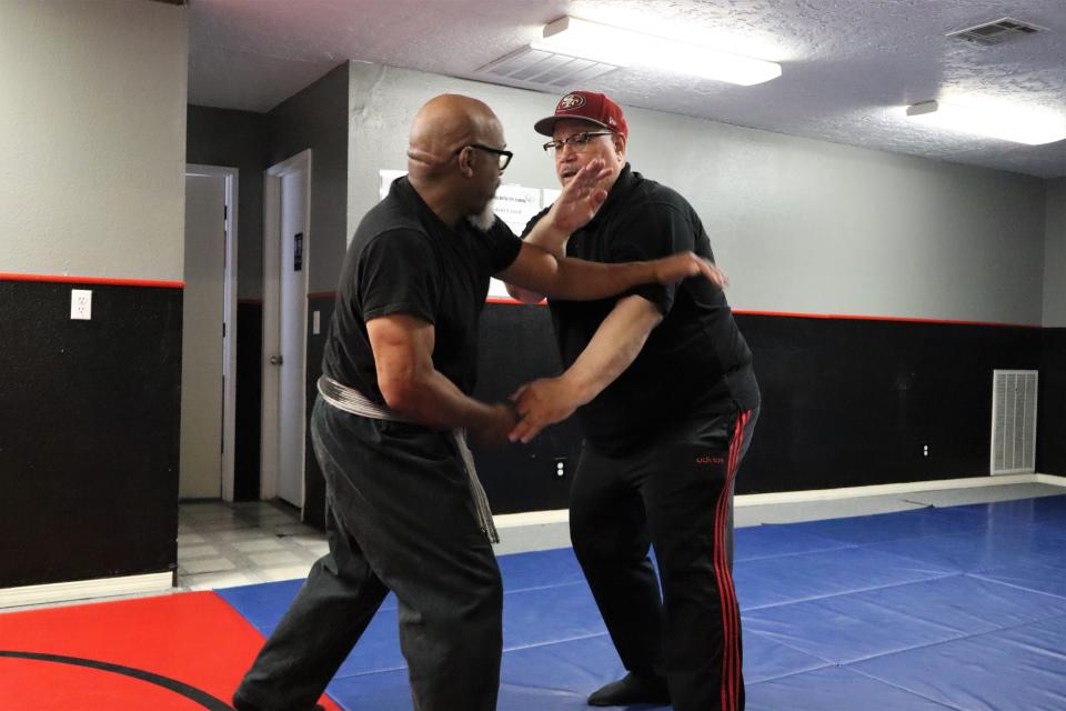 Don Burnell, 60, and James Suber, 59, demonstrate Wing Chun, a concept-based martial art.