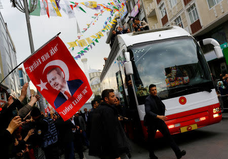 A bus carrying Turkish President Tayyip Erdogan leaves following a ceremony in Istanbul, Turkey, March 26, 2017. REUTERS/Murad Sezer