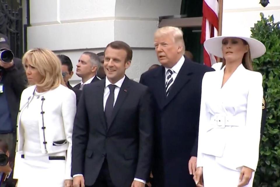 Awkward moment Donald Trump tries to hold Melania’s hand during Emmanuel Macron's visit