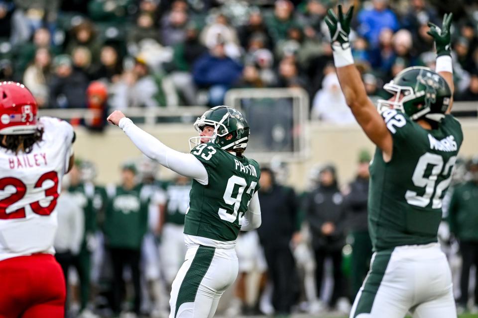 Michigan State's Ben Patton, center, celebrates after making a field goal against Rutgers during the fourth quarter on Saturday, Nov. 12, 2022, in East Lansing.