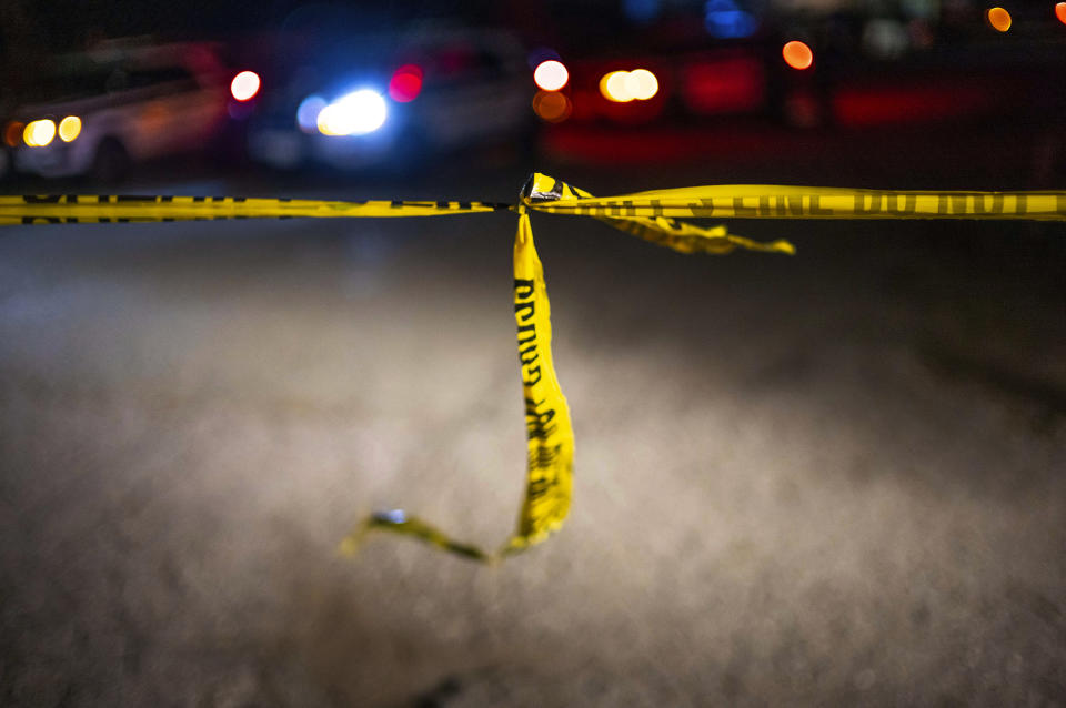 Police tape from the San Mateo Country Sheriffs office mark the perimeter of the scene of a shooting, after a gunman killed several people at two agricultural businesses in Half Moon Bay, Calif., on Tuesday, Jan. 24, 2023. Officers arrested a suspect in Monday’s shootings, 67-year-old Chunli Zhao, after they found him in his car in the parking lot of a sheriff’s substation, San Mateo County Sheriff Christina Corpus said.(AP Photo/ Aaron Kehoe)