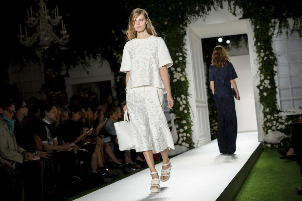 A model wears a design created by Mulberry during London Fashion Week Spring/Summer 2014, at Claridges Hotel in central London, Sunday, Sept. 15, 2013. (Photo by Jonathan Short/Invision/AP)