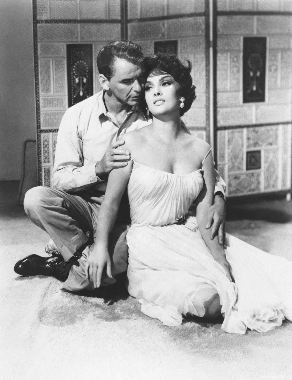 FILE - Frank Sinatra and Gina Lollobrigida in a still from "Never So Few," 1959. Lollobrigida has died in Rome at age 95. Italian news agency Lapresse reported Lollobrigida’s death on Monday, Jan. 16, 2023 quoting Tuscany Gov. Eugenio Giani. (AP Photo, File)