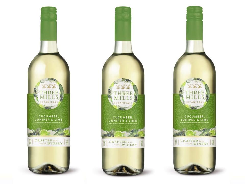 Aldi alcoholic beverage in clear and green bottle packaging
