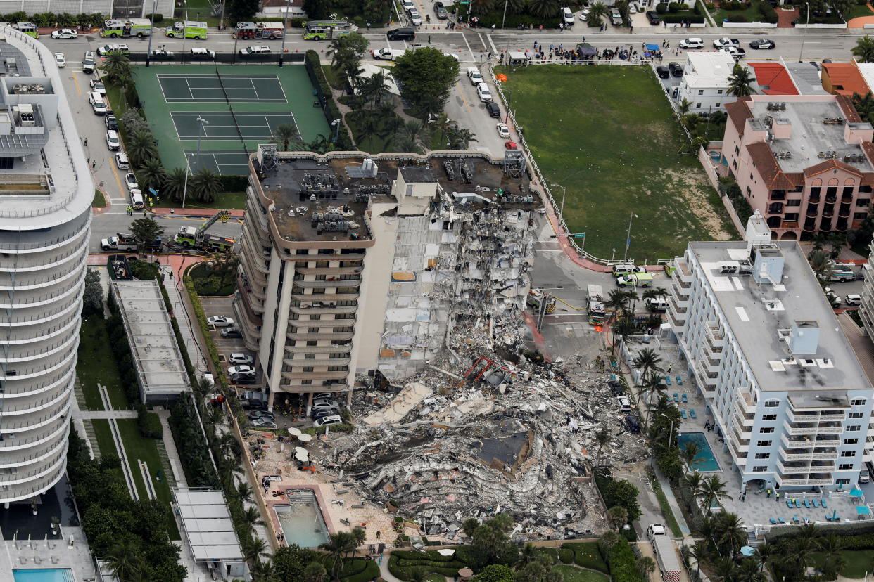 An aerial view showing a partially collapsed building in Surfside near Miami Beach, Florida, U.S., June 24, 2021. REUTERS/Marco Bello
