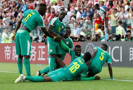 Soccer Football - World Cup - Group H - Poland vs Senegal - Spartak Stadium, Moscow, Russia - June 19, 2018 Senegal's M'Baye Niang celebrates scoring their second goal with team mates REUTERS/Grigory Dukor