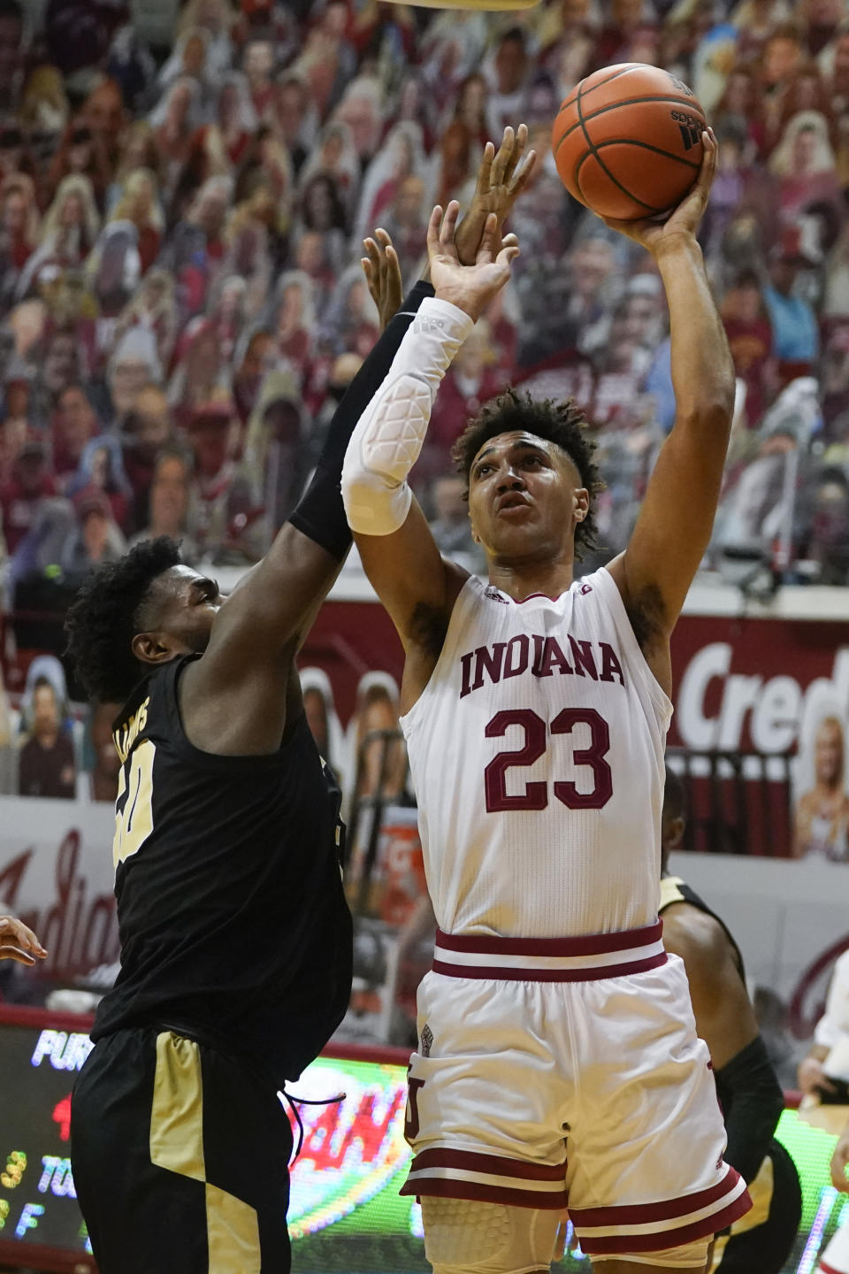 Indiana's Trayce Jackson-Davis (23) shoots over Purdue's Trevion Williams (50) during the second half of an NCAA college basketball game Thursday, Jan. 14, 2021, in Bloomington, Ind. Purdue won 81-69. (AP Photo/Darron Cummings)