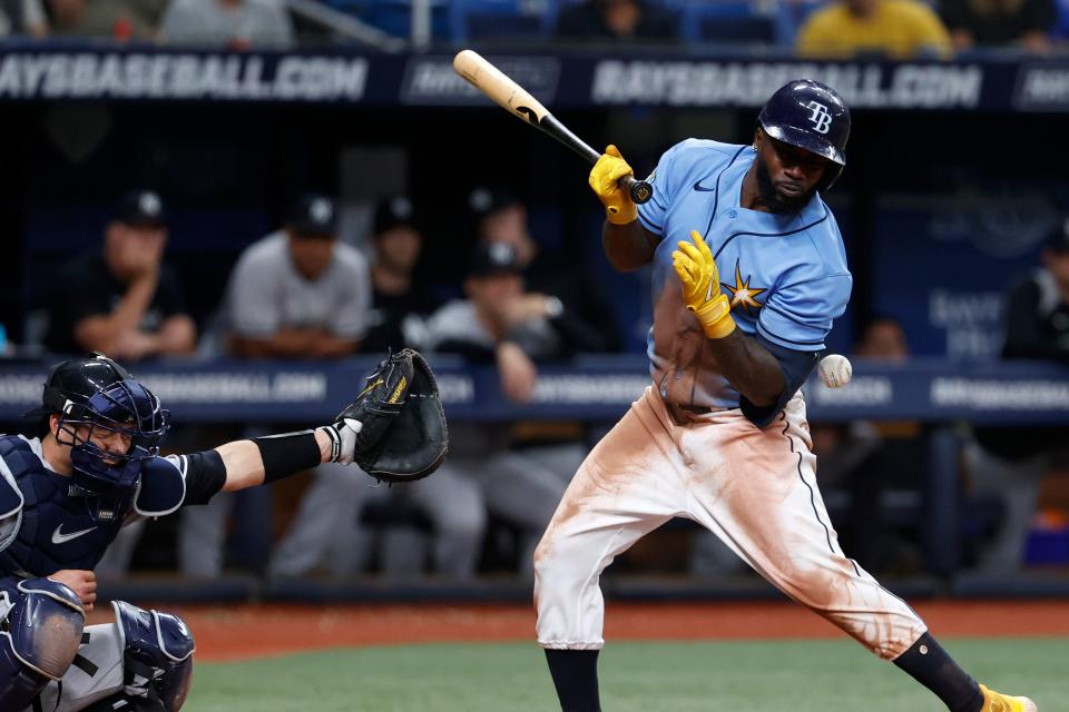 Tampa Bay Rays' Randy Arozarena is hit by a pitch from New York Yankees relief pitcher Albert Abreu during the eighth inning.