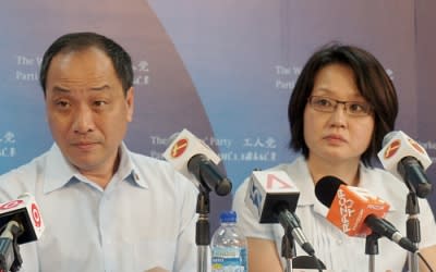 Workers' Party chief Low Thia Khiang and chairman Sylvia Lim counter the People's Action Party leaders' criticism of their proposals. (Yahoo! photo/Fann Sim)